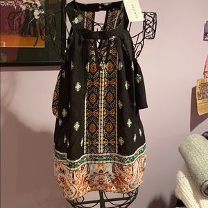 Brand new cold shoulder top. Tag on.